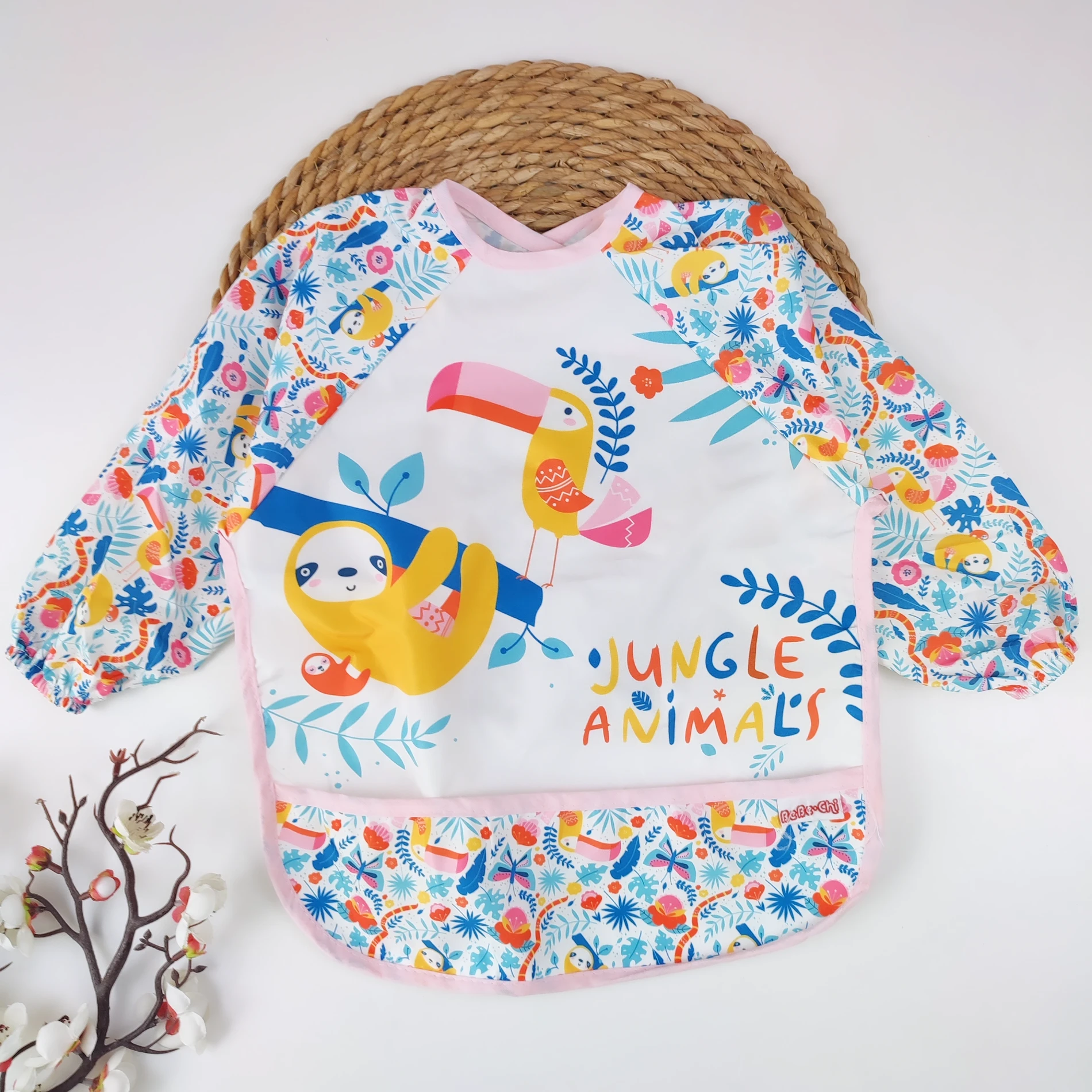 BEBEK UNISEX 0-2 YAŞ KOLLU PAPAĞANLI DESEN CEPLİ ÖNLÜK